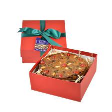 Immediately drizzle 1/3 of the glaze on the bottom (top) of the cake. Ruth Pretty Boxed Christmas Cake 1 2kg Moore Wilson S
