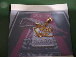 Led zeppelin was inducted in 1995 into the rock and roll hall of fame. Jimmy Page Led Zeppelin Zoso Gold