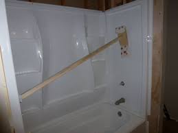 It's inexpensive and doesn't require relocating the tub, plus you can do it yourself. How To Replace A Bathtub Step By Step Installation Guide Dengarden
