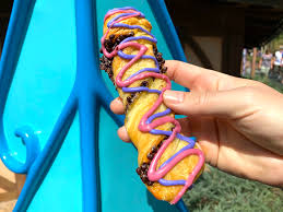 Everyone is excited to get one! Snack Review Cheshire Cat Tail Magic Kingdom Magic Guidebooks