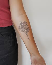 Flower tattoo designs for women. Forget About Your Zodiac Sign These Gorgeous Birth Flower Tattoos Are So Much Better Birth Flower Tattoos Family Tattoos Bouquet Tattoo