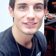 Guy with dark brown long hair. A Brown Haired Guy Wearing A Blue Shirt Smiles Gif On Imgur