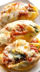 Spinach And Ground Beef Stuffed Shells A Delicious Way To Sneak A Veggie Into Your Kids Meal Recipes Food Ground Beef Stuffed Shells