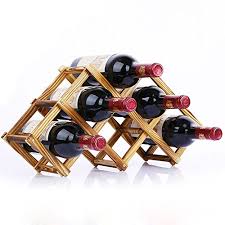 The oblique holds the bottle horizontally such that the center of mass is roughly above the middle of the footprint of the holder. Flexible Collapsible Pine Wooden Grape Red Wine Bottle Rack Folding Decor Stemless Leaning Corner Shelf Simple Stand Unusual Organizer Holder Stylish Storage Interesting 6 Bottle Carbonized Color Buy Online In Bahamas At Bahamas Desertcart Com