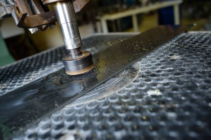 Manual Metal Polishing vs. Automatic Metal Polishing Services - Helander Metal Spinning Company