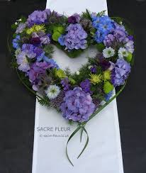Check spelling or type a new query. Blues And Purples Summer Heart Funeral Tribute Funeral Flower Arrangements Funeral Flowers Flower Service