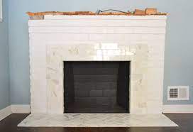 We have a ventless free fireplace that opens on two sides. Our Fireplace Makeover Building A New Mantel Young House Love