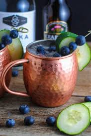 12 Refreshing Moscow Mule Recipes That Have Us Dreaming Of Summer Moscow Mule Recipe Mule Recipe Blueberry Vodka