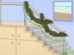 Measure the length of the banister where the garland will hang, and add about 1 foot to your measurements for every 3 feet of banister. 3 Ways To Hang Garland On Stairs Wikihow