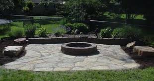 There's an option for everyone. Flagstone Patio With Fire Pit Progressive Lawnscaping Outdoor Fire Pit Outdoor Fire Pit Designs Fire Pit Backyard