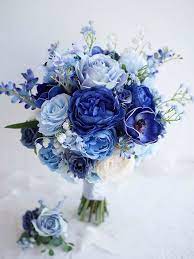 This is a unique cascading bouquet made with artificial flowers in royal blue, silver and white. 40 Chic Blue Wedding Bouquet Ideas Blue Wedding Bouquet Blue Flowers Bouquet Blue Wedding Flowers