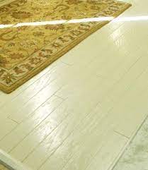Refinishing 70 year old oak hardwood floors. Working With Worn Out Hardwood Floors How One Reader Painted Hers For Less Than 100 Http Emilyaclark Painted Wood Floors Painted Hardwood Floors Flooring