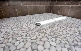 Use them at front entrance or shower floor and wall they are ideal for decorative use. Pebble Tile Shower Floor Popular Design Types Designing Idea