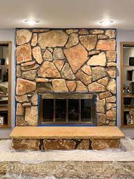 Outstanding river rock fireplace design photo inspiration appealing living room fireplace ideas and best 10 diy whitewash fireplace Limewash Stone Fireplace Makeover Bye Bye Orange Stone Fireplace Hello Neutral Stone Beauty Average But Inspired