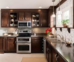 Oak Kitchen Cabinets Paired With The Rich Deep Beauty Of Our Umber Finish Brings Charm An Birch Kitchen Cabinets Kitchen Cabinetry Design Oak Kitchen Cabinets