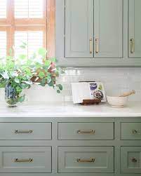 For a long time, white has dominated kitchen design. Pin By Cookie And Kate On Small Kitchen Remodel Kitchen Design Painted Kitchen Cabinets Colors Green Kitchen Cabinets