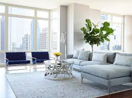 A large chair is a type of chair that is designed as a smaller version of a regular sofa and primarily for comfort. Gray Sofa With Chaise Lounge And Blue Velvet Accent Chairs Contemporary Living Room
