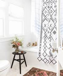 To help you with this difficult task, we've compiled the ultimate list. 12 Beautiful Shower Curtains For Every Budget