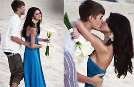 Justin should have thought about bringing along a pair of sunglasses or a baseball cap to wear to keep the sun out of his eyes. Hugedomains Com Bieber Selena Justin Bieber Selena Gomez Justin Bieber Pictures