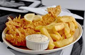 Remove the basket and drain the fish and chips on paper towels; Traditional British Fish And Chips Recipe