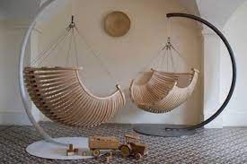 This rustic rattan chair is the perfect affordable addition to your bedroom. Suspended Seating By Concept Suspendu Hanging Chair Outdoor Chair Design Wooden Swinging Chair