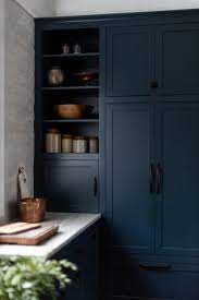 Shop cabinets.com for cabinet hardware. Hale Navy Kitchen Cabinets Against Gray Moroccan Tile Backsplash Hgtv
