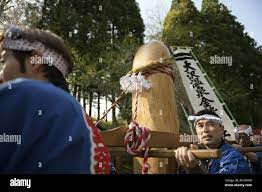 IWATE, JAPAN - APRIL 29 : A large wooden phallus named Konsei-sama, which  is named after a fertility god, is seen in the festival grounds during the  Konsei fertility Festival at Osawa