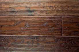 Handscraped hardwood floors are a current trend that leaves distinct groves and marks on a floor, giving a room warmth, history, and personality. Beautiful Hand Scrapped Hardwood Floors