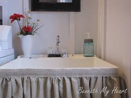 dressing up a mud room sink beneath