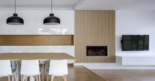 Low Budget Idea For A Fireplace Surround Use Strips Thin Wood Evenly Spaced Along A Plain Wall Fireplace Design Fireplace Surrounds Modern Fireplace
