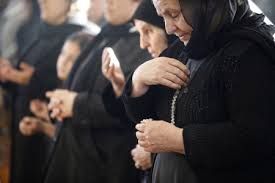 Image of NAJLA HARB MOURNS AT THE FUNERAL OF HER SON FARID