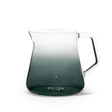 Mighty Small Glass Carafe Fellow This wax melting pot features a plastic handle that stays cool for easy handling, and a tapered spout for precise pouring.