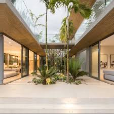 Stunning villa with a curved roofline inspired. Azchitecture The Courtyard House A Modern Villa With Impressive Open Space Design Ideas