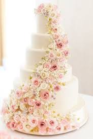 Such a simple wedding cake decorating idea to turn a simple cake into something a little more 'wow' is by adding some beautiful blooms. White Wedding Cake Decorated With Sugar Flowers Deer Pearl Flowers