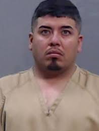 Officers have arrested a 35 year-old male after seizing a firearm and drugs  following a motorcycle collision investigation in Oshawa