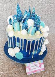 To make the frosting, beat the cream cheese and butter. Red Velvet Cake With Shades Of Blue Buttercream Frosting And White Chocolate Ganache Drips Topped With M Birthday Drip Cake Blue Birthday Cakes Blue Drip Cake