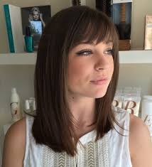 They are never out of many indie rockers have worn this medium hairstyle with bangs because it is fierce yet laid back many women would be afraid to pair straight bangs with crazy natural curls, but the final look is edgy. 70 Perfect Medium Length Hairstyles For Thin Hair In 2020