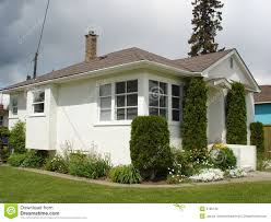 Gray's sophisticated mix of modern and timeless style makes it natural choice for exteriors. Little White Stucco House White Stucco House Stucco Homes White Stucco