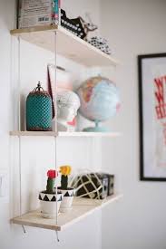 Ring and rope hanging shelves. Diy Hanging Rope Shelf Liz Morrow