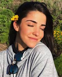 She looks almost the same, didn't age one year at all. She moved to NY  right after she graduated in Boca and is now graduated at NYC too. She's  very close friends