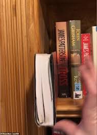 Digital brochure faux books videos. Father Creates Secret Hideway Behind A Fake Bookshelf Express Digest