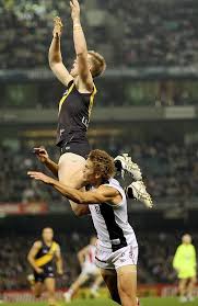 Jack riewoldt's wife carly ziegler and daughter poppy cheer him. Jack Riewoldt Marks Over Sam Gilbert Richmond Football Club Australian Football Australian Football League