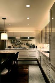 While installing recessed lights won't add actual square feet to the room, they will give the illusion and feeling of more open space by removing that interruption from the ceiling, since they. Installation Gallery Kitchen Lighting Minimalist Kitchen Design Minimalist Kitchen Kitchen Design