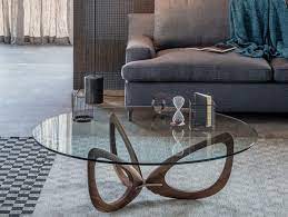 With two layers of glass, you can easily store items like magazines or decorative accents underneath while still having plenty of space for drink glasses and more. Modern Coffee Tables With Round Glass Tops And Timeless Designs
