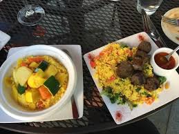 Remove stewed lamb and the sausage/vegetable mixture from the oven. Seven Vegetable Couscous And Lamb Sausage Skewer With Couscous Picture Of Medina Oven Bar Dallas Tripadvisor