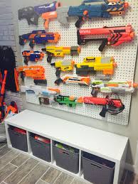 I spent no money as i had the materials lying around. Nerf Gun Storage