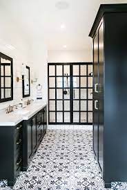 Another simple decor idea for your black and white bathroom is to replace your old mirror with a lighted mirror. 25 Incredibly Stylish Black And White Bathroom Ideas To Inspire Black White Bathrooms Bathroom Farmhouse Style Modern Farmhouse Bathroom