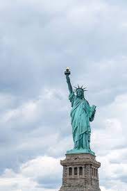 Visiting The Statue Of Liberty S Crown And Ellis Island Boxy Colonial On The Road Extended Family Photography Family Photos Family Photoshoot Poses