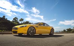 Image result for Sunburst Yellow 2012 Aston Martin