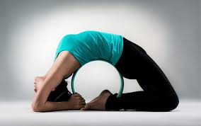 Yoga Wheel Instagram Trend Or Legit Yoga Prop Wellness Myfitnesspal Yoga Wheel Yoga Props Muscle Cramp